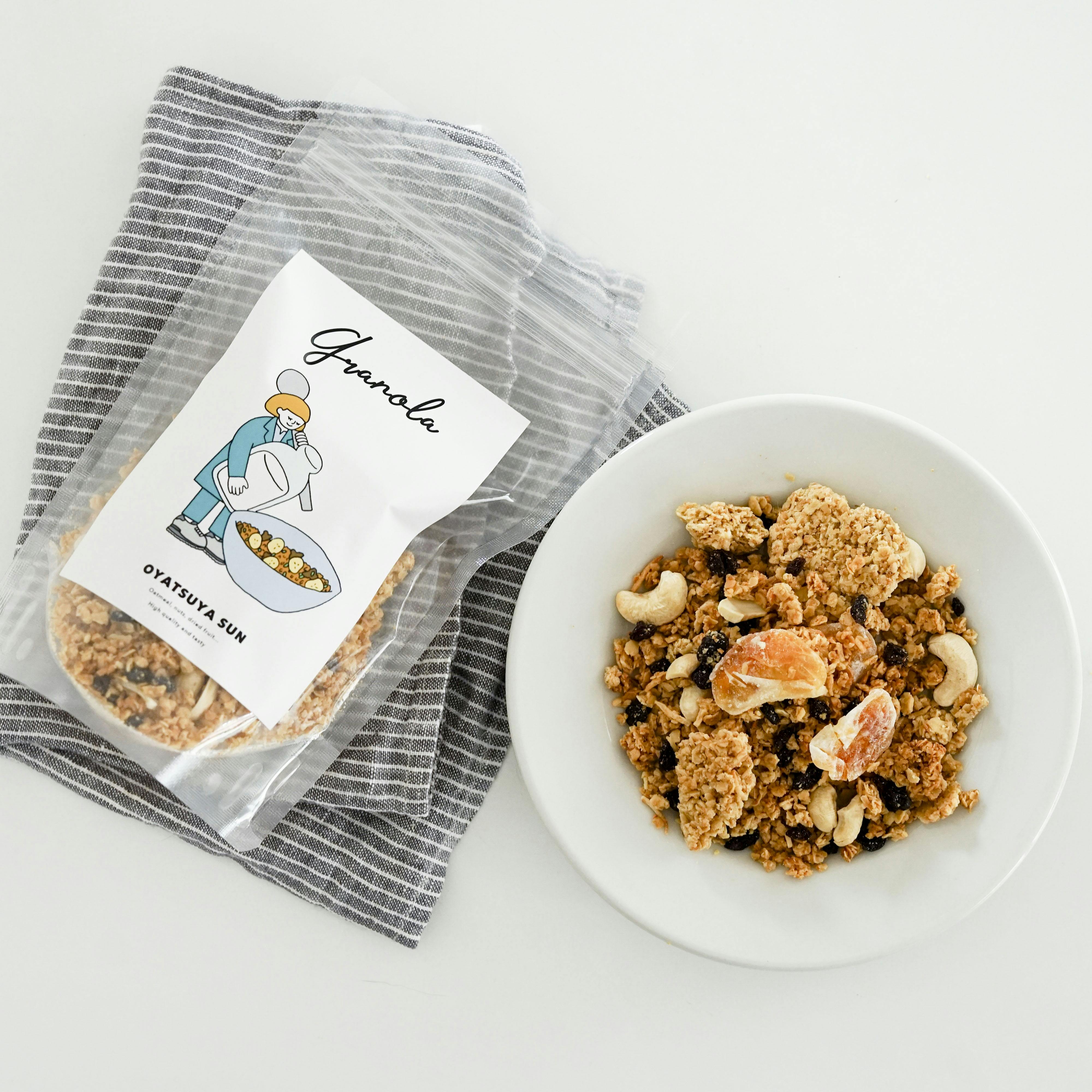 【取扱終了】【おひとり様2点まで】温州みかんとシチリアレモンのグラノーラ/OYATSUYA SUN（袋）の商品写真