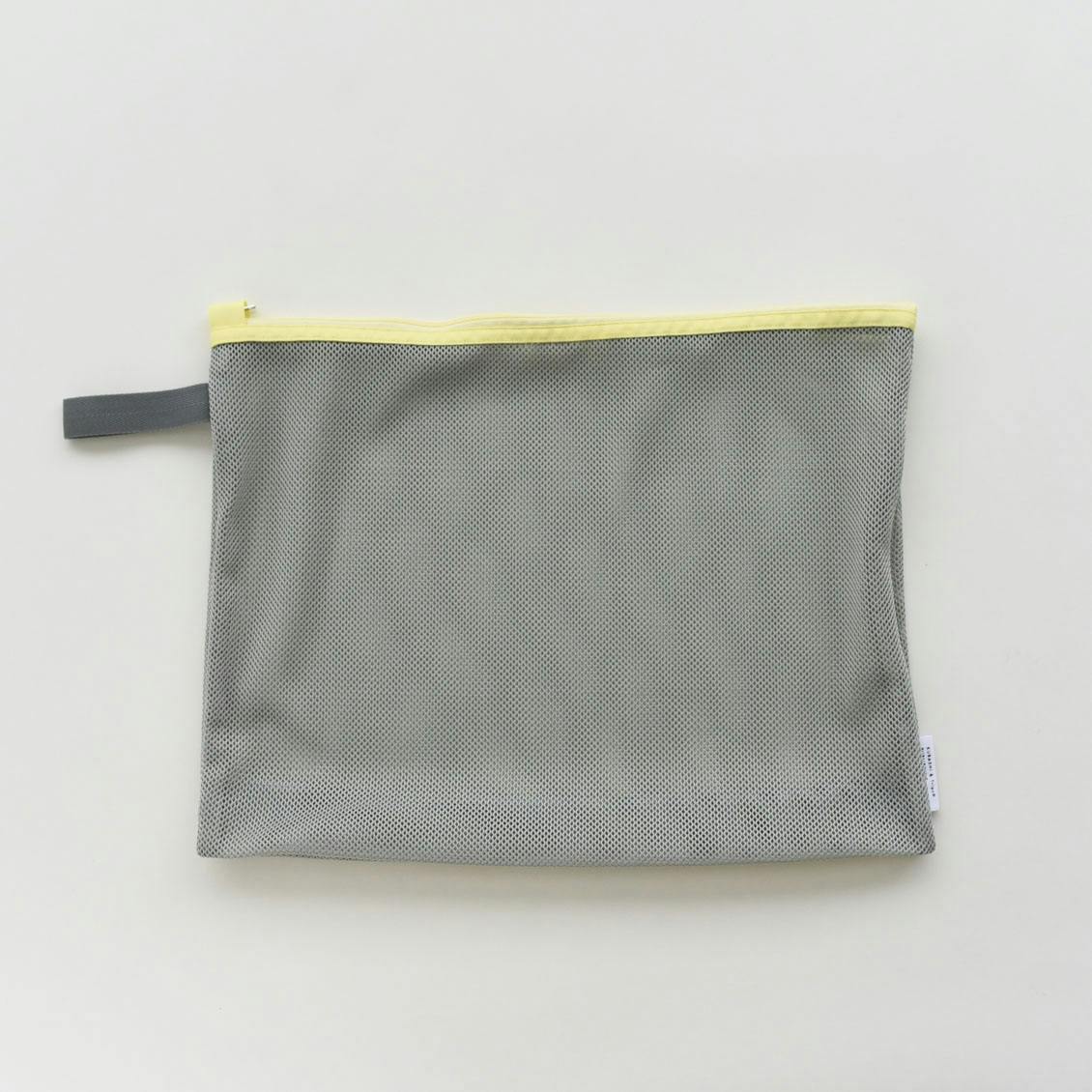 「持って帰ってまるごと洗濯」ランドリーネットにもなる衣類ケース / Mサイズ（イエロー）の商品写真